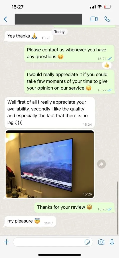 WhatsApp support conversation guiding user through Firestick setup